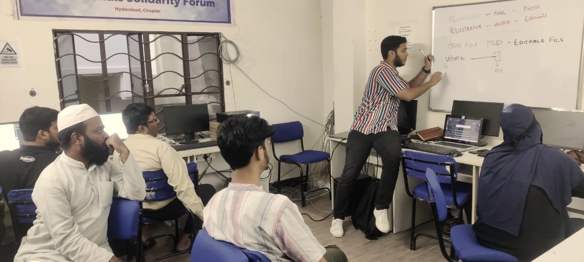Abdulrahman teaching a graphic design class